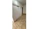 Bedroom featuring neutral colors, tile flooring, and a closet at 503 Crony Ave, Henderson, NV 89011