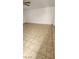 Large bedroom featuring tile flooring, a ceiling fan, and neutral walls at 503 Crony Ave, Henderson, NV 89011