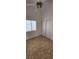 Bright bedroom features ceiling fan, a window, and closet space at 503 Crony Ave, Henderson, NV 89011