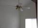 Ceiling fan with light fixture providing cooling and illumination to the room at 503 Crony Ave, Henderson, NV 89011