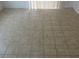 Close-up of neutral-toned tiled floors throughout the home, creating a clean and modern look at 503 Crony Ave, Henderson, NV 89011