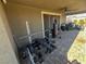 Covered outdoor workout area with gym equipment and ceiling fan at 5096 Maverick, Las Vegas, NV 89130