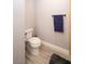 Modern toilet in bathroom featuring neutral wall color, tile flooring, and black towel bar at 5250 S Rainbow Blvd # 2033, Las Vegas, NV 89118