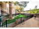Community dog park with pet-friendly turf, agility equipment, and dog waste station at 5250 S Rainbow Blvd # 2033, Las Vegas, NV 89118