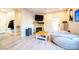 Comfortable living room with fireplace, mounted TV, and a modern stylish layout at 5250 S Rainbow Blvd # 2033, Las Vegas, NV 89118