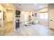 Spacious living room with fireplace, neutral walls, and a view to a well-lit exterior at 5250 S Rainbow Blvd # 2033, Las Vegas, NV 89118