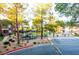 Safe community playground area with mature shade trees and proximity to community parking at 5250 S Rainbow Blvd # 2033, Las Vegas, NV 89118