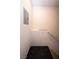Carpeted stairway with white railings and neutral-colored walls at 5250 S Rainbow Blvd # 2033, Las Vegas, NV 89118