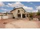 Large backyard featuring desert landscaping, covered patio and balcony at 5609 Hannah Gordon Ct, North Las Vegas, NV 89081