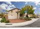 Corner lot featuring a landscaped yard and a covered front porch at 5609 Hannah Gordon Ct, North Las Vegas, NV 89081