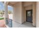 Covered porch with security door and column detail at 5609 Hannah Gordon Ct, North Las Vegas, NV 89081