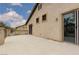 Large patio with stucco walls and iron railing at 5609 Hannah Gordon Ct, North Las Vegas, NV 89081