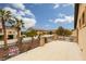 Expansive patio offers neighborhood views, palm trees and manicured landscaping at 5609 Hannah Gordon Ct, North Las Vegas, NV 89081