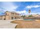 Spacious backyard featuring a pool, large patio, and second story patio space at 5751 E Owens Ave, Las Vegas, NV 89110