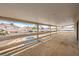 Large balcony overlooking the backyard and pool area of this residence at 5751 E Owens Ave, Las Vegas, NV 89110