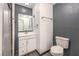 Bathroom with white vanity, mirror and shower at 5751 E Owens Ave, Las Vegas, NV 89110