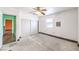 Bedroom with a window, a ceiling fan, and a sliding closet at 5751 E Owens Ave, Las Vegas, NV 89110