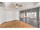 The open living room features high ceilings, recessed lights and hardwood floors at 5751 E Owens Ave, Las Vegas, NV 89110