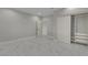 Bright bedroom with neutral walls, tile floors, closet organizer, and ample space at 60 E Levi Ave, Las Vegas, NV 89183