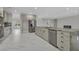 Open concept kitchen with stainless steel appliances and a large island at 60 E Levi Ave, Las Vegas, NV 89183