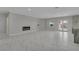 Living room featuring marble floors and a modern fireplace at 60 E Levi Ave, Las Vegas, NV 89183