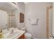 Bathroom with tub-shower combo, single sink vanity, and wall decor at 6255 W Arby Ave # 193, Las Vegas, NV 89118