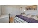 Bright bedroom featuring a large painting above the bed and a sliding door closet at 6255 W Arby Ave # 193, Las Vegas, NV 89118