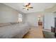 Bright bedroom with hardwood floors and ceiling fan at 6255 W Arby Ave # 193, Las Vegas, NV 89118