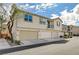 Exterior of a lovely townhouse complex with manicured landscaping at 6255 W Arby Ave # 193, Las Vegas, NV 89118