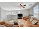 Bright living room featuring hardwood floors, neutral paint, and large windows at 6255 W Arby Ave # 193, Las Vegas, NV 89118