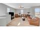 Bright living room with hardwood floors, ceiling fan, and an airy atmosphere at 6255 W Arby Ave # 193, Las Vegas, NV 89118