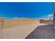 This home features a low maintenance backyard with desert landscaping and block wall at 8286 Skye Gorge St, Las Vegas, NV 89166