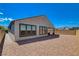 This home features a low maintenance backyard with desert landscaping at 8286 Skye Gorge St, Las Vegas, NV 89166