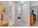 Hallway leading to bedroom and bath, featuring neutral walls and carpeted flooring at 8286 Skye Gorge St, Las Vegas, NV 89166