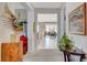 Inviting hallway featuring artwork and décor, leading to the living areas and dining room at 8286 Skye Gorge St, Las Vegas, NV 89166