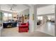 Functional office space featuring built-in bookshelves and ample natural light, with living room access at 8286 Skye Gorge St, Las Vegas, NV 89166
