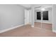 Inviting bedroom with carpet, mirrored closet doors and neutral colored walls at 8620 Cremona Dr, Las Vegas, NV 89117