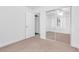 Inviting bedroom with carpet, mirrored closet doors and ceiling fan at 8620 Cremona Dr, Las Vegas, NV 89117