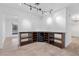 Dining area features wine storage and stylish lighting at 8620 Cremona Dr, Las Vegas, NV 89117