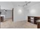 Open living area with ample lighting, light flooring, and a wine rack at 8620 Cremona Dr, Las Vegas, NV 89117