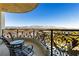 Private balcony with wrought iron railing offering city and mountain views at 9103 Alta Dr # 602, Las Vegas, NV 89145