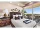 Inviting bedroom with a private balcony and scenic views, perfect for relaxation and enjoying the outdoors at 9103 Alta Dr # 602, Las Vegas, NV 89145