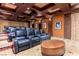 Comfortable home theater featuring reclining seating, a projector, and a coffered ceiling at 9103 Alta Dr # 602, Las Vegas, NV 89145