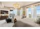 Bright main bedroom with a balcony, a TV, and a picturesque view at 9103 Alta Dr # 602, Las Vegas, NV 89145