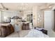 Spacious main bedroom with accent lighting, seating area, and ensuite bathroom at 9103 Alta Dr # 602, Las Vegas, NV 89145