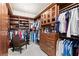 Spacious walk-in closet with custom shelving and storage solutions for shoes, clothes, and accessories at 9103 Alta Dr # 602, Las Vegas, NV 89145