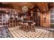 This wine cellar features ample storage, a unique island, and wood accents providing an upscale experience at 9103 Alta Dr # 602, Las Vegas, NV 89145