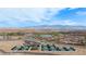 Scenic aerial view of the community's golf course, tennis courts, and surrounding desert landscape at 950 Overland Trl, Mesquite, NV 89034