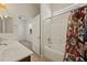 Bathroom featuring double sinks and a shower and tub combo at 950 Overland Trl, Mesquite, NV 89034