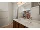 Bathroom featuring double sinks and a shower and tub combo at 950 Overland Trl, Mesquite, NV 89034